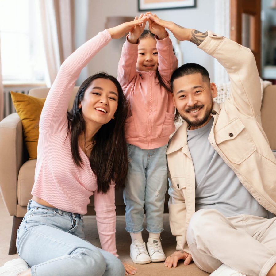 asian-family-with-child-celebrating-homeownership-2023-05-12-21-05-26-utc.jpg